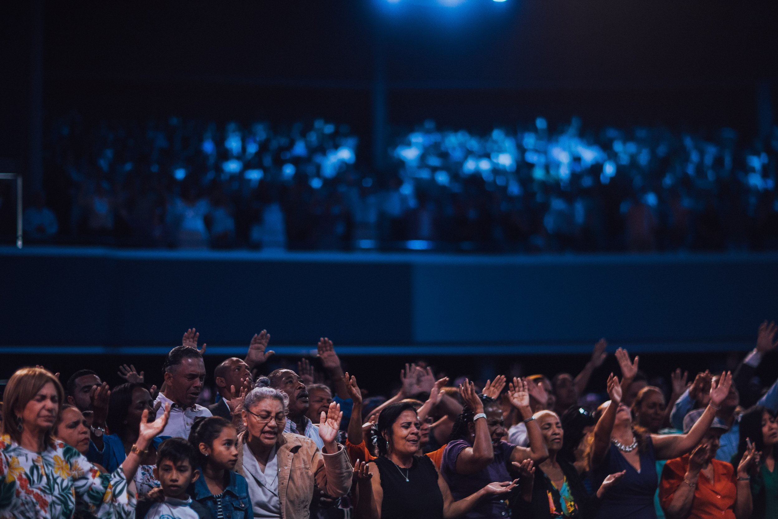 People Raising Hands